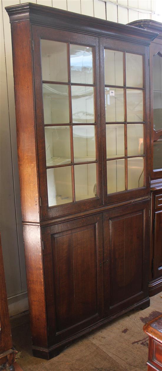 An 18th century oak corner cupboard, W.3ft 10.5in.